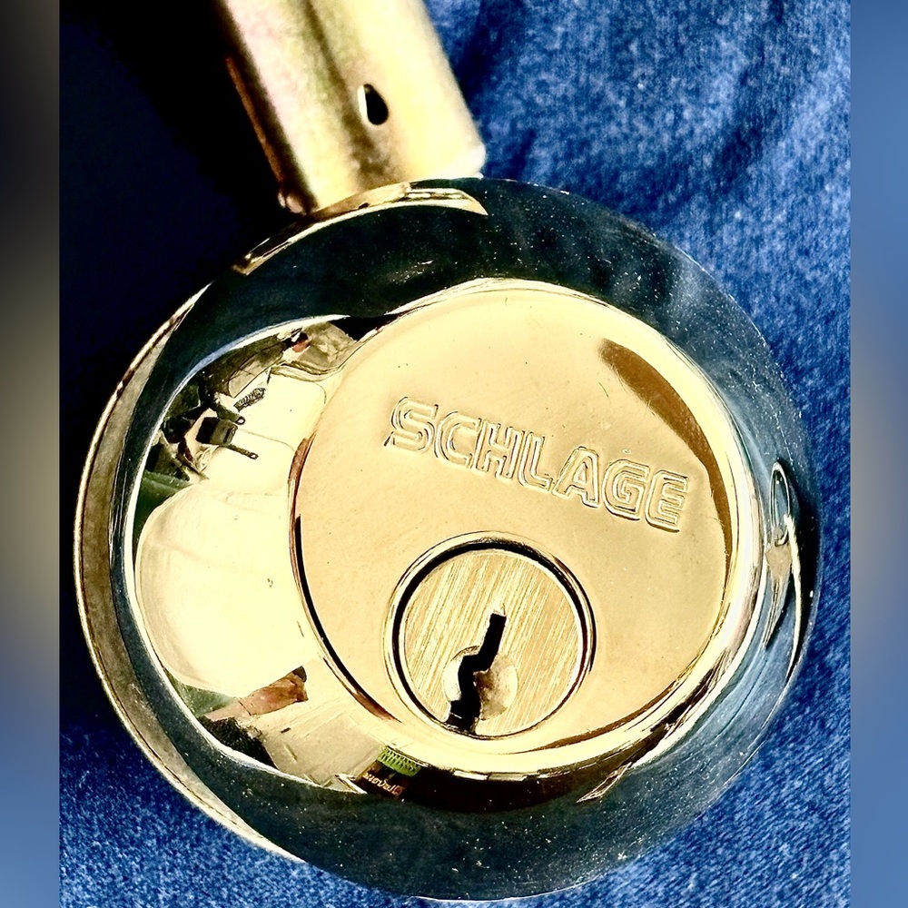 “SCHLAGE” POLISHED KEYED DEADBOLT…